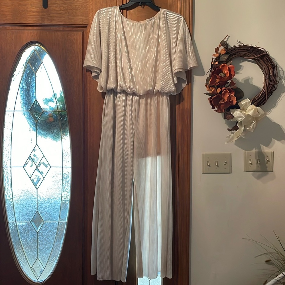 Beautiful jumpsuit worn only once to my daughter’s bridal shower.